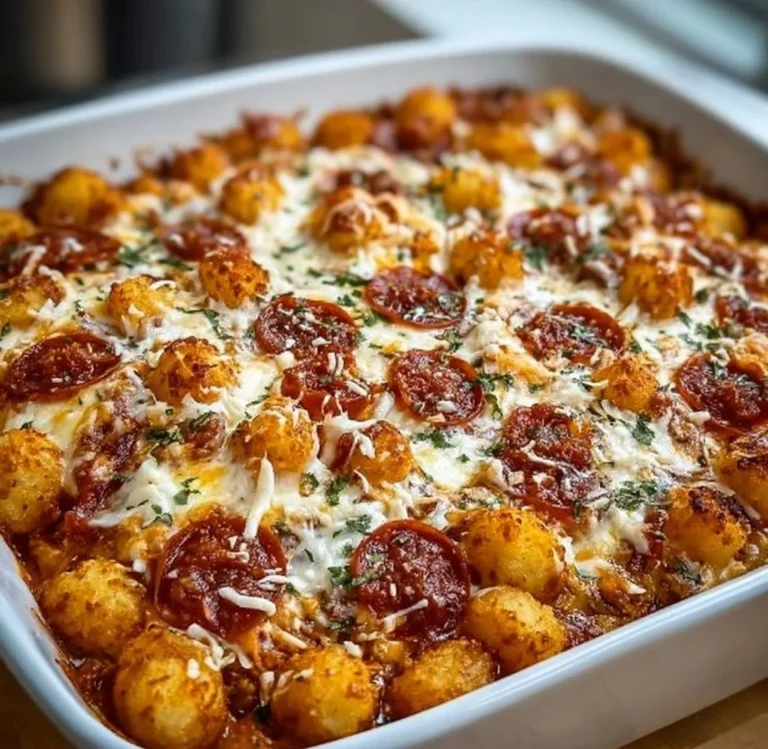 Delicious Pizza Tot Casserole topped with cheese and pepperoni